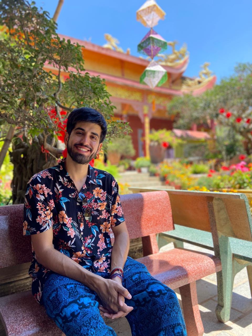 Gustavo E. Pascuali smiling outdoors